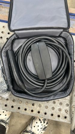 brand new tesla wall charger with both adapters