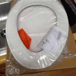 New Toilet Seat