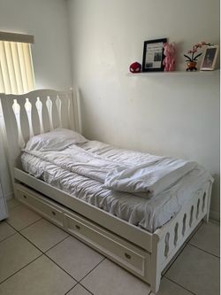 White twin bed frame with storage