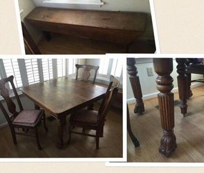 Antique solid oak table with claw legs and 4 chairs