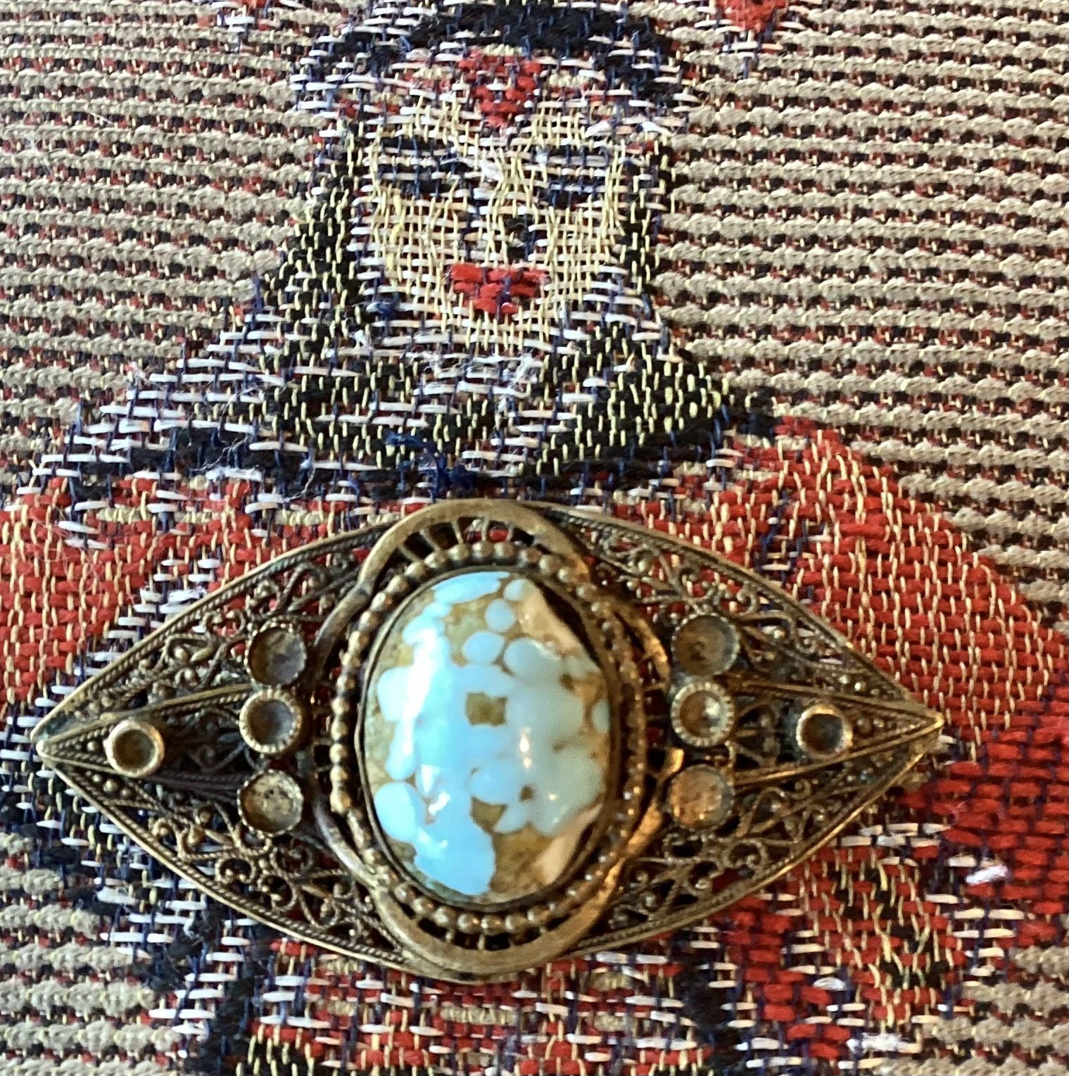Vtg. intriguing faux turquoise, filigree brooch.