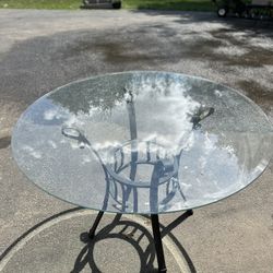 Glass top outdoor patio table