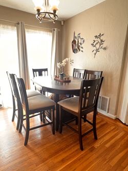 Counter-Height / Bar-Height Dining Table + 6 Chairs — Oval, Dark Wood, Built-In Storage — Priced to Sell Fast