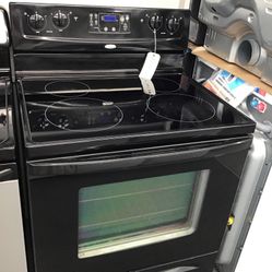 Whirlpool 4 burner Glass Top Range. 1 year Warranty 