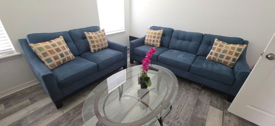 Sofa and loveseat set with table