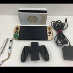 NINTENDO SWITCH OLED HAC-016 ZELDA EDITION WITH DOCK AND CHARGER (P(contact info removed)0)
