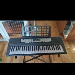 Yamaha EZ-200 61-Keys Portable Touch Lighted Electronic Keyboard  & Adapt