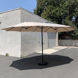 (New in box) $130 Large 15x9 FT Double Sided Umbrella with Weight Base set (Beige color) 