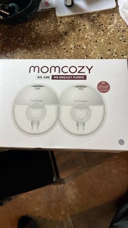 Momcozy m5 breast pumps brand new still in plastic