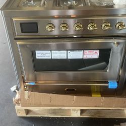 ilve magestic new open box 36 inches  warranty ready to deliver..duelfeud gas and electric new warranty..$4500..great stove warranty