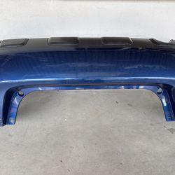 2008–2014 Nissan Rogue Rear Bumper Cover – Blue OEM