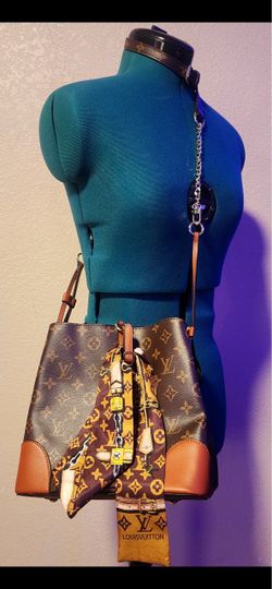 LV monogram bucket with accessory strap