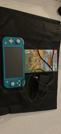 Nintendo Switch Lite  with one game and charger