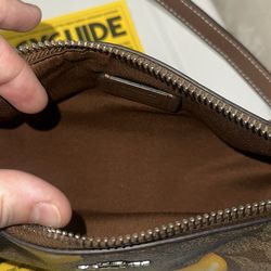 Coach New York puse with bananas