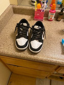 Size 9.5 mens Nike Dunk Low Black and White Sneakers