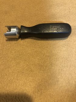 Snap on brake hold down tool.