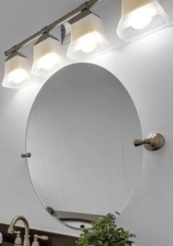 MOEN Banbury 23 in. W x 26 in. H Oval Bathroom Mirror