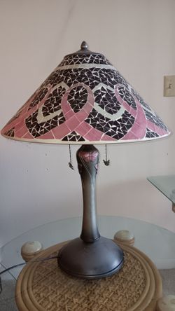Starlight glass mosaic lamp featuring a pink ribbon motif on the shade.