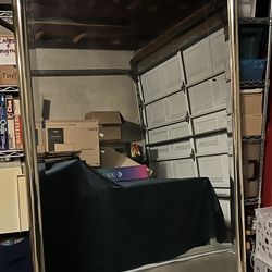 Large beveled mirror with gold frame