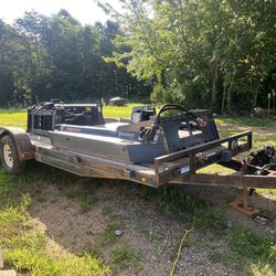 Landscaping Equipment And A Hauler Trailer 