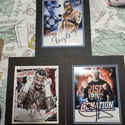 Three WWE Authentic Autographs