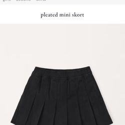 Kids 56 black, pleated mini skort