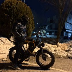 E-bike orange black rigorious seat big tires