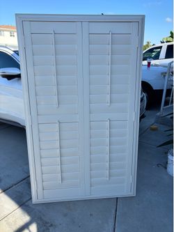 Faux wood shutters