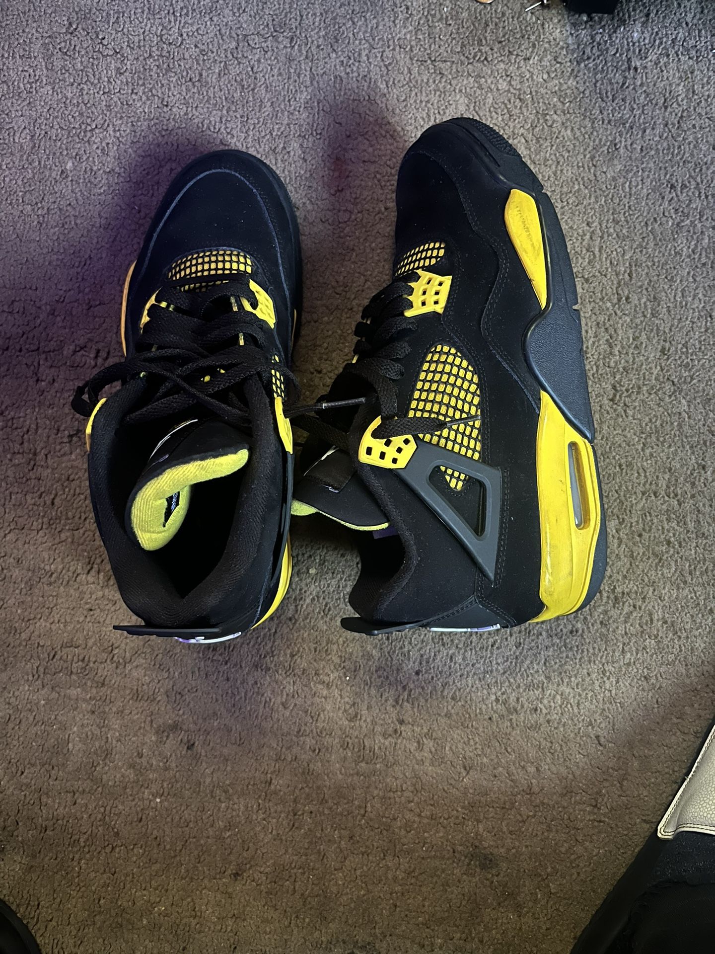 Jordans 4s Retro thunder.