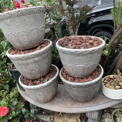 Medium Resin Planters $10.00 Each.