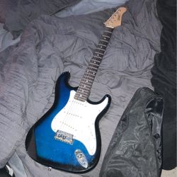 zeny stratocaster dark blue electric guitar + bag