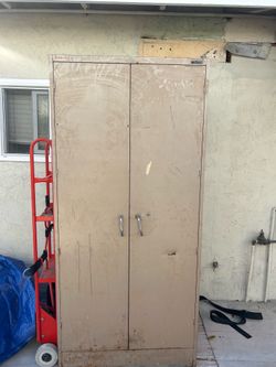 Free metal storage  cabinet and lawnmower