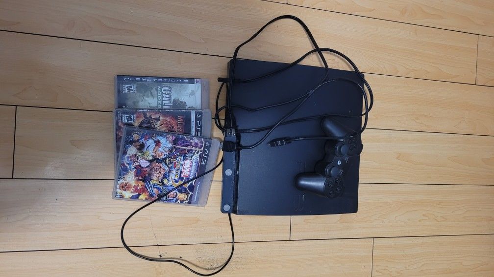 Used PS3 (With Console, Cables, And 3 Games)