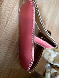 Pink weightlifting belt