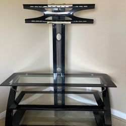 3-in-1  TV Stand & Console Fits up to 70" 50" W x 21" D x 50" H.