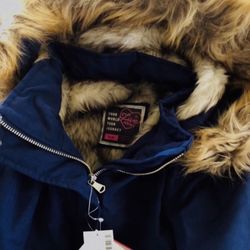 Super cute the Parka Jacket. Size 18/20 in girls, (like a medium, size 8) in woman’s, super cute!! Made with great material, navy blue, compared to ot