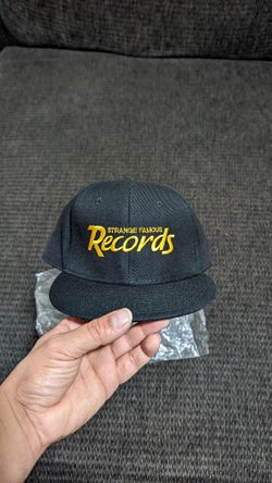 Strange Famous Snapback Hat signed by Sage Francis