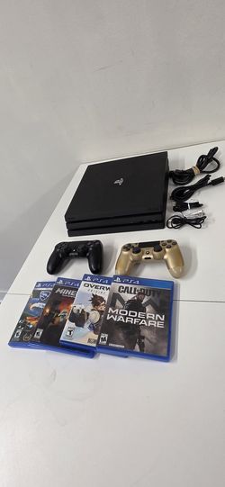 Sony PlayStation 4 Pro 1TB Bundle – 2 Controllers, All Cables + 4 Games