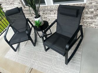 Like new rocking chairs and rug.