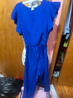 Woman’s blue jump sute size 9Y