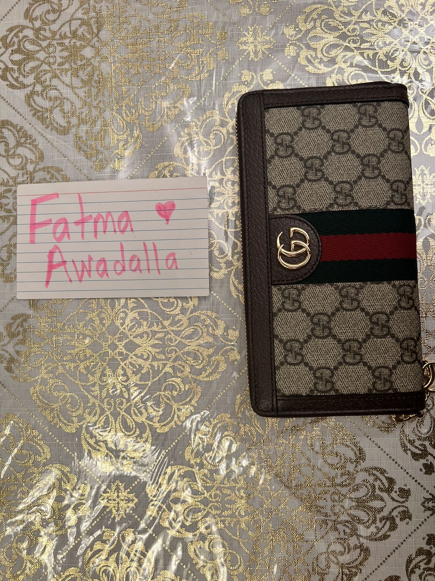 Ophidia GG zip around wallet.