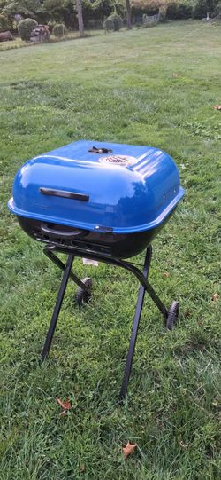 Charcoal barbecue with very little use - cover also include