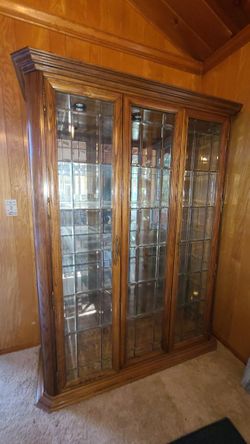 $200 - Beautiful China Cabinet. 3 Interior Lights. Beveled Glass Doors. Approximate Size  W 58 / D 18.75 / H 76. Very Nice Piece Of Furniture.  