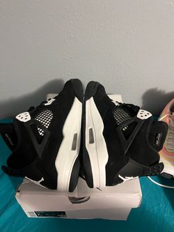 Air Jordan 4 Black and White Sneakers