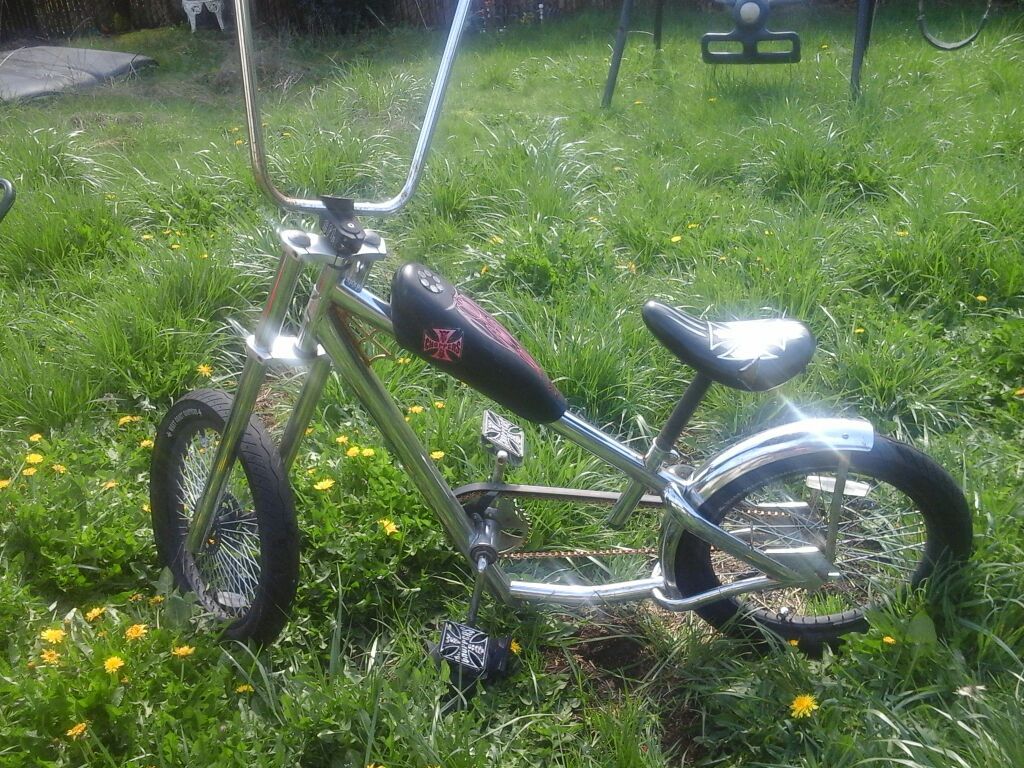 Custom Jesse James chopper bike with with tall ape hanger bars