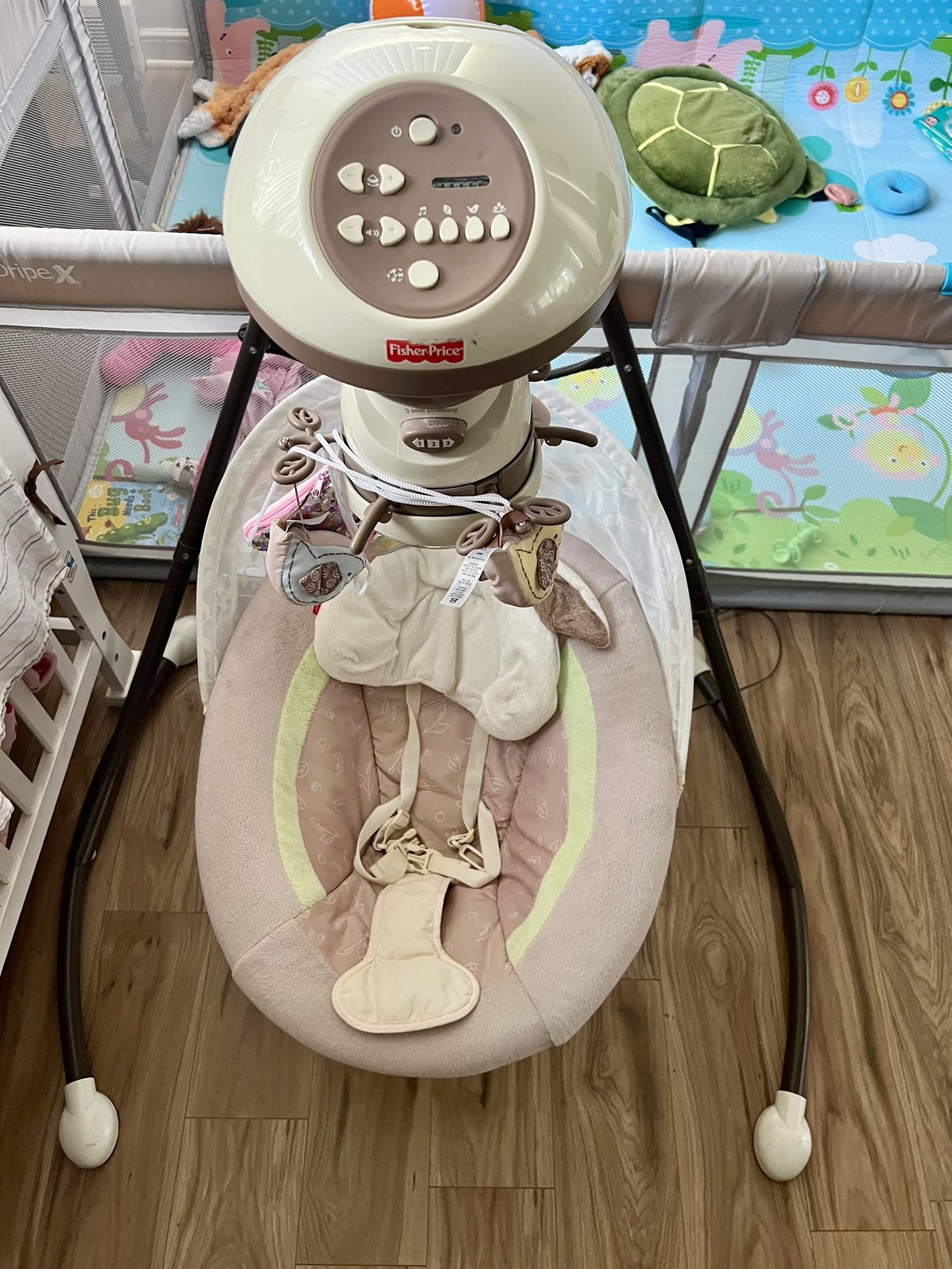 Sway swing from Fisher Price. Good condition.
