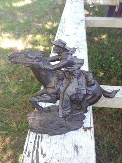 Cowboy Statue on a horse.