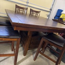 High top table with 6 chairs