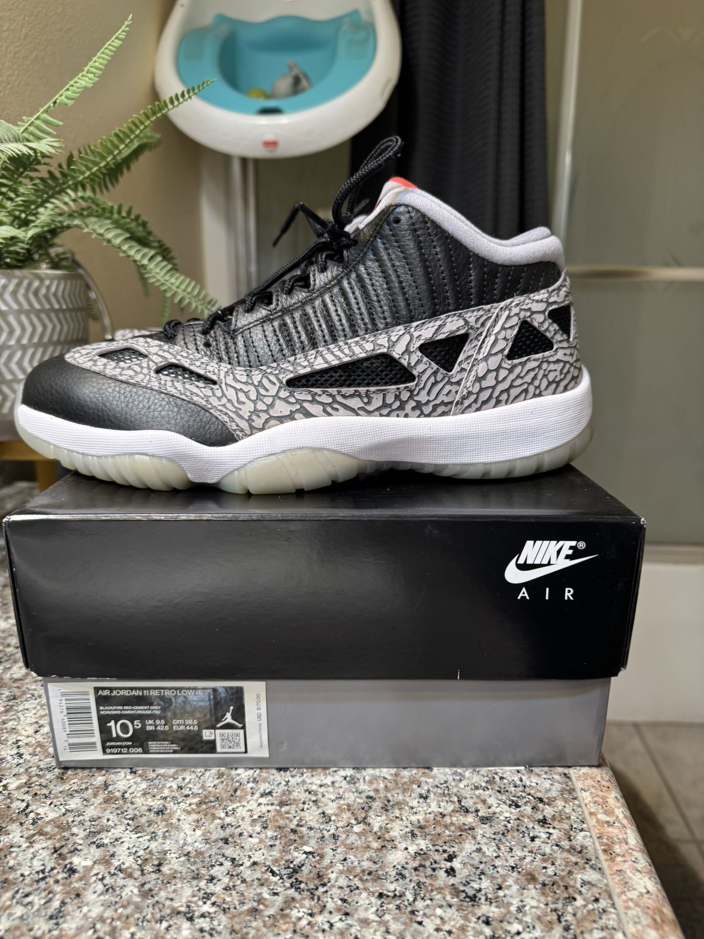 Jordan 11 Low IE Black Cement