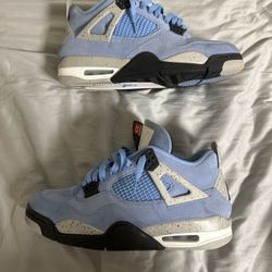 Used Air Jordan 4 UNC size 11 good condition W/Box